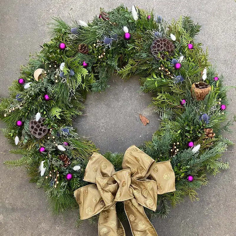 Find beautiful, custom-designed Christmas holiday wreath at Burnett's Country Gardens.