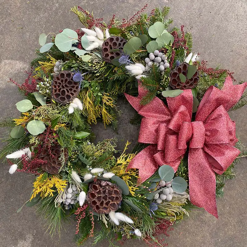 Find beautiful, custom-designed Christmas holiday wreath at Burnett's Country Gardens.